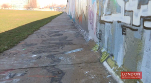 What was the impact of the wall coming down in East Berlin?